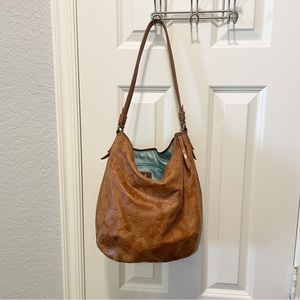 The Sak Brown Brown Leather Purse with Boho Detailing.   Embossed Flowers.